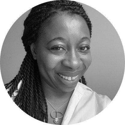 a woman with a leopard print shirt and a smile